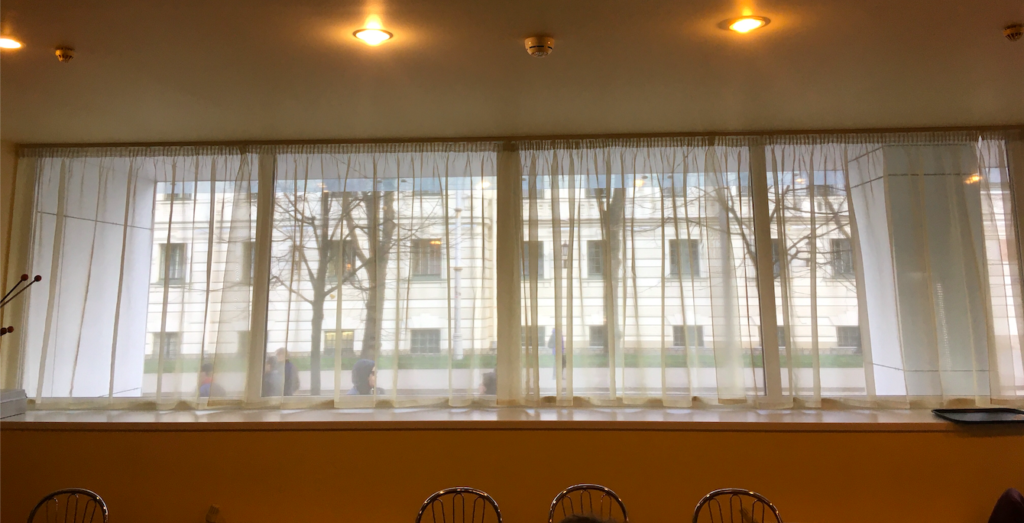 frilly curtains at a canteen in riga